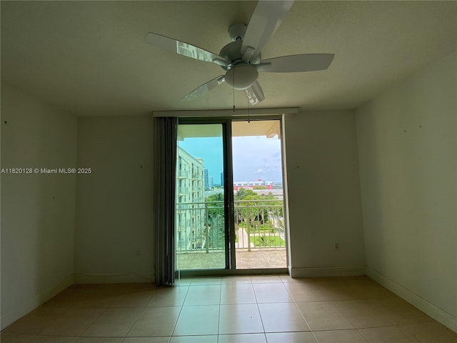 610 Clematis St Unit 721, West Palm Beach, FL 33401 - unfurnished room with ceiling fan and light tile patterned floors
