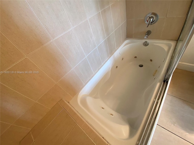 610 Clematis St Unit 721, West Palm Beach, FL 33401 - full bathroom with a tub with jets and tile patterned flooring