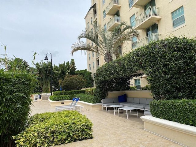 610 Clematis St Unit 721, West Palm Beach, FL 33401 - view of patio featuring an outdoor living space