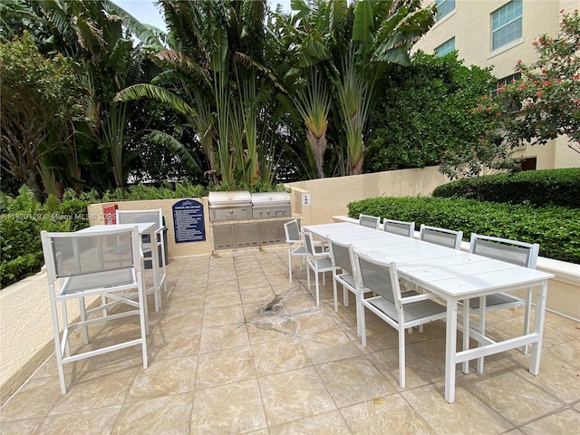 610 Clematis St Unit 721, West Palm Beach, FL 33401 - view of patio featuring outdoor dining area