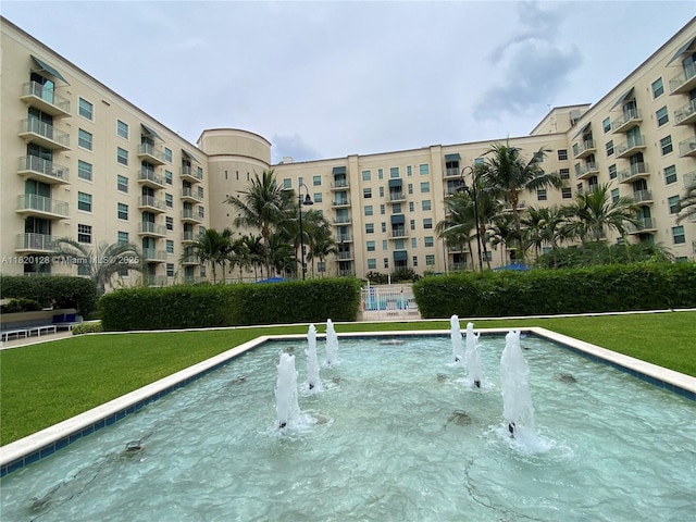 610 Clematis St Unit 721, West Palm Beach, FL 33401 - view of pool featuring a lawn