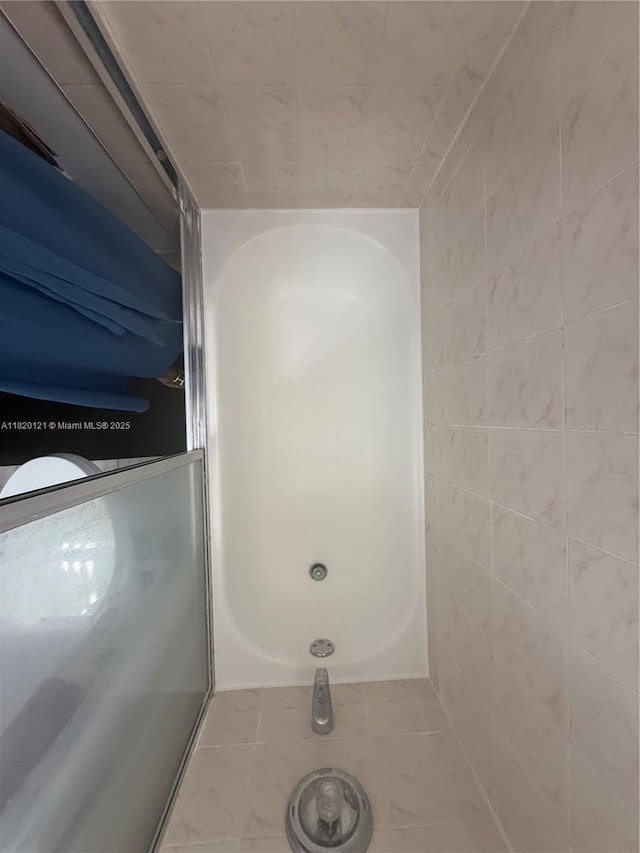 2413 W 73rd Pl, Hialeah, FL 33016 - full bathroom with tile patterned floors
