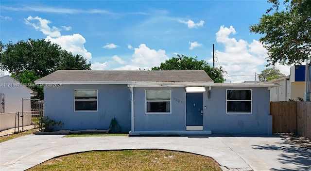 1301 SW 33rd Ter, Fort Lauderdale, FL 33312 - view of front of home featuring stucco siding and roof with shingles