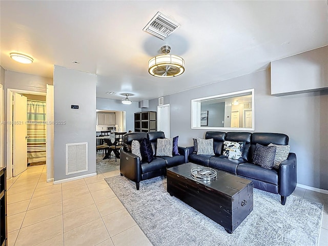 1301 SW 33rd Ter, Fort Lauderdale, FL 33312 - living area featuring light tile patterned flooring and baseboards