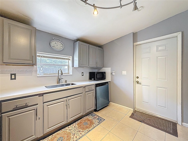 1301 SW 33rd Ter, Fort Lauderdale, FL 33312 - kitchen featuring a sink, dishwasher, black microwave, and gray cabinetry