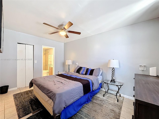 1301 SW 33rd Ter, Fort Lauderdale, FL 33312 - bedroom with light tile patterned floors, ceiling fan, and connected bathroom