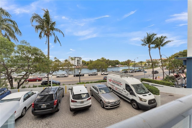 2457 Collins Ave Unit 201, Miami Beach, FL 33140 - uncovered parking lot with a water view
