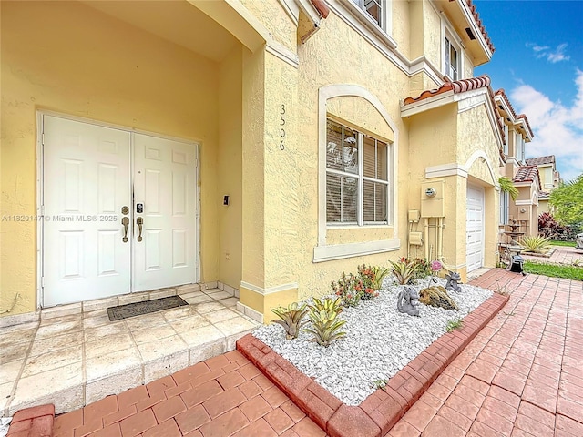 3506 SW 171st Ave, Miramar, FL 33027 - property entrance with stucco siding and a garage