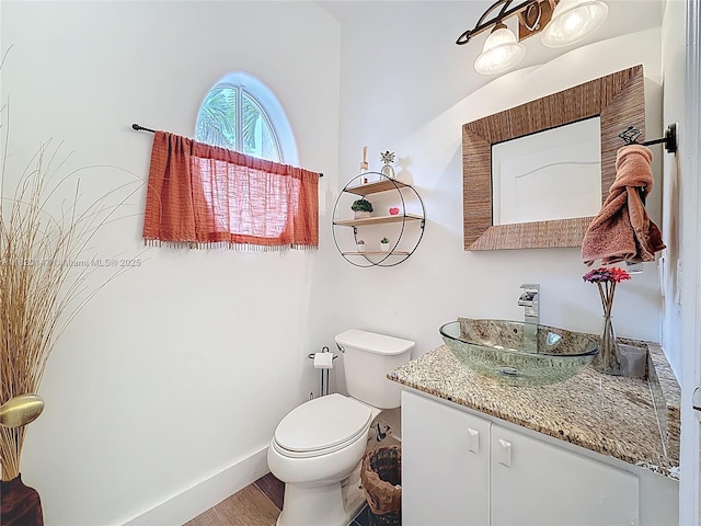 3506 SW 171st Ave, Miramar, FL 33027 - half bathroom featuring vanity and wood finished floors