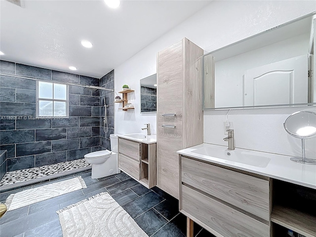 3506 SW 171st Ave, Miramar, FL 33027 - bathroom with two vanities, a tile shower, and recessed lighting
