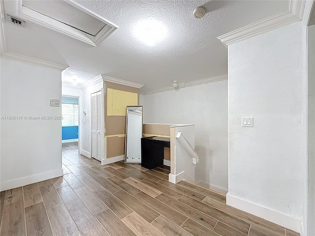 3506 SW 171st Ave, Miramar, FL 33027 - unfurnished room featuring a textured ceiling, light wood-style flooring, and crown molding