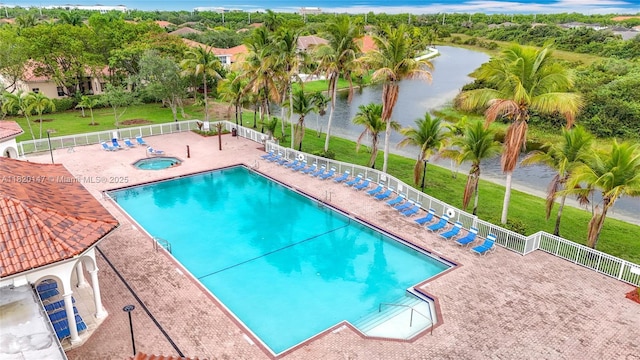 3506 SW 171st Ave, Miramar, FL 33027 - community pool with a water view, a patio area, and a community hot tub