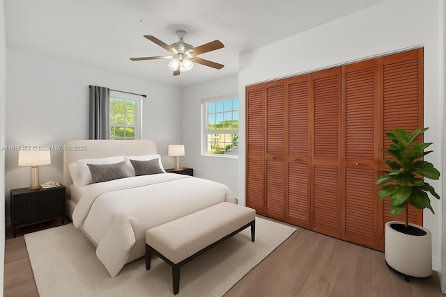6561 SW 18th St, West Miami, FL 33155 - bedroom featuring light wood finished floors, a closet, and a ceiling fan