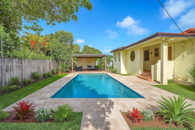 6561 SW 18th St, West Miami, FL 33155 - view of pool with a fenced backyard, a patio area, an outdoor living space, and entry steps