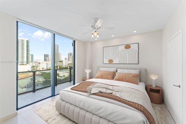 88 SW 7th St Unit 712, Miami, FL 33130 - bedroom featuring access to exterior, a skyline view, expansive windows, recessed lighting, and ceiling fan