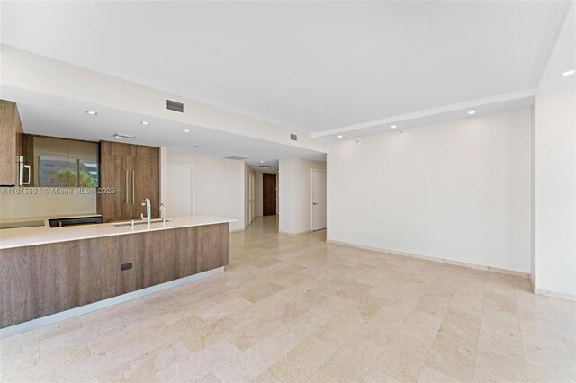88 SW 7th St Unit 712, Miami, FL 33130 - unfurnished living room with recessed lighting