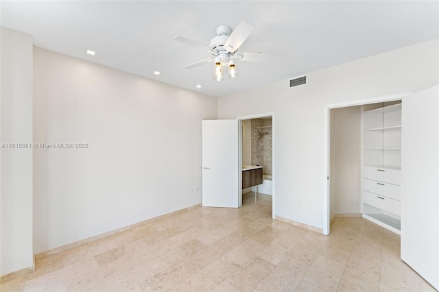 88 SW 7th St Unit 712, Miami, FL 33130 - unfurnished bedroom with a spacious closet, recessed lighting, a closet, connected bathroom, and a ceiling fan