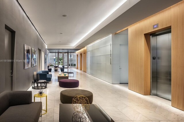 88 SW 7th St Unit 712, Miami, FL 33130 - building lobby featuring wood walls