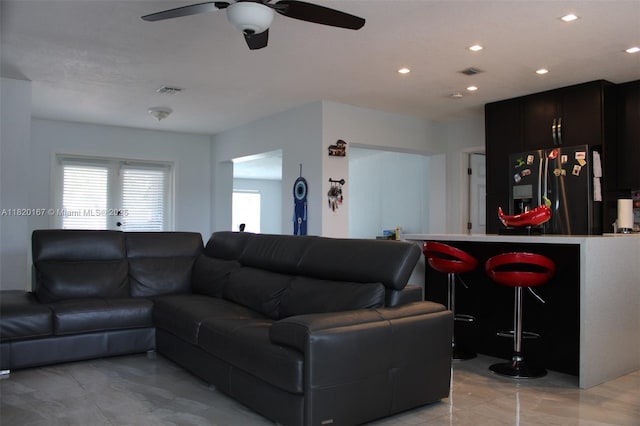 6810 Douglas St, Hollywood, FL 33024 - living room featuring a ceiling fan and recessed lighting