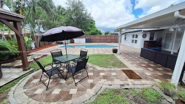 6810 Douglas St, Hollywood, FL 33024 - fenced backyard with a patio and outdoor dining space