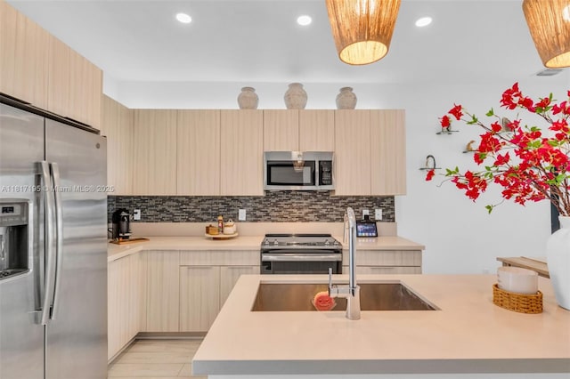 4740 NW 84th Ct Unit 38, Doral, FL 33166 - kitchen with stainless steel appliances, light countertops, modern cabinets, and recessed lighting