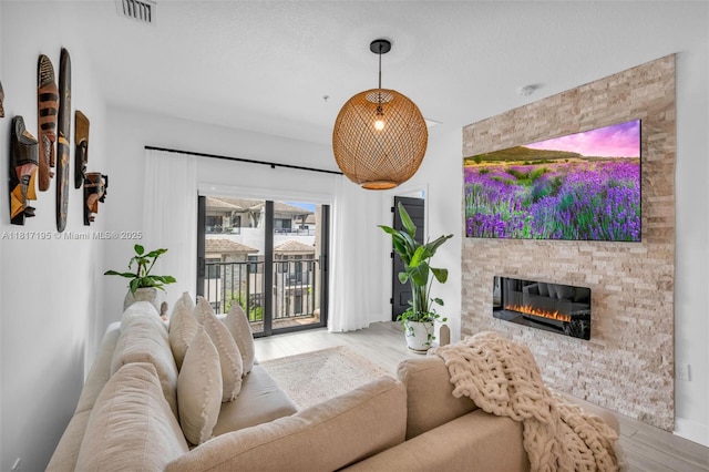 4740 NW 84th Ct Unit 38, Doral, FL 33166 - living room with wood finished floors and a fireplace
