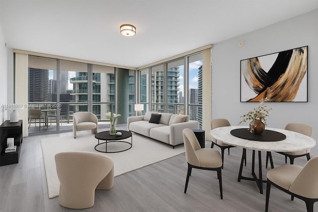 90 SW 3rd St Unit 1413, Miami, FL 33130 - living area with a wall of windows, a view of city, and wood finished floors