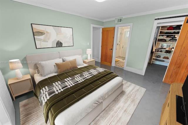 901 W Tropical Way, Plantation, FL 33317 - bedroom featuring a spacious closet, finished concrete floors, a closet, crown molding, and ensuite bath