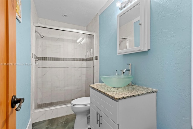 901 W Tropical Way, Plantation, FL 33317 - full bathroom with a stall shower, vanity, and a textured wall