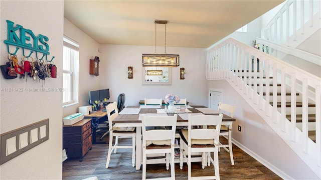 2389 NE 4th St, Homestead, FL 33033 - dining room featuring wood finished floors and stairway