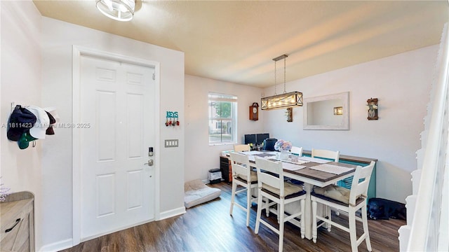 2389 NE 4th St, Homestead, FL 33033 - dining area with dark wood-type flooring and baseboards