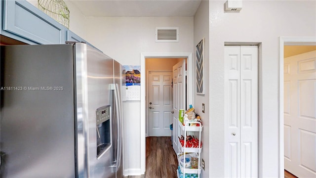 2389 NE 4th St, Homestead, FL 33033 - kitchen with stainless steel fridge and dark wood-style flooring