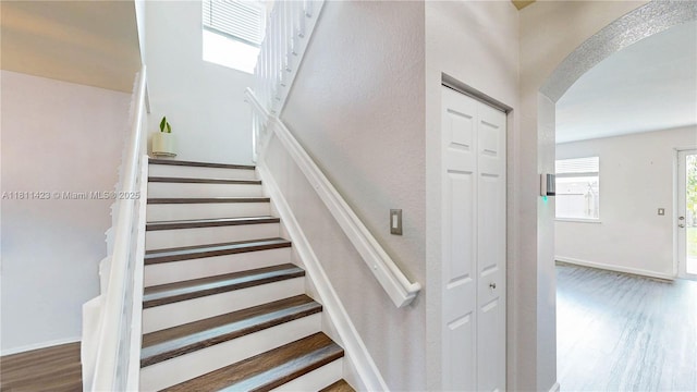 2389 NE 4th St, Homestead, FL 33033 - stairway with arched walkways and wood finished floors