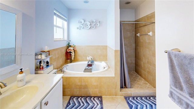 2389 NE 4th St, Homestead, FL 33033 - full bathroom featuring tiled shower, tile patterned flooring, a garden tub, and vanity