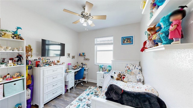 2389 NE 4th St, Homestead, FL 33033 - bedroom with wood finished floors, an office area, and ceiling fan