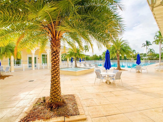 2389 NE 4th St, Homestead, FL 33033 - community pool with a patio