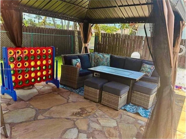 680 NW 111th Way, Coral Springs, FL 33071 - view of patio with a gazebo and an outdoor living space