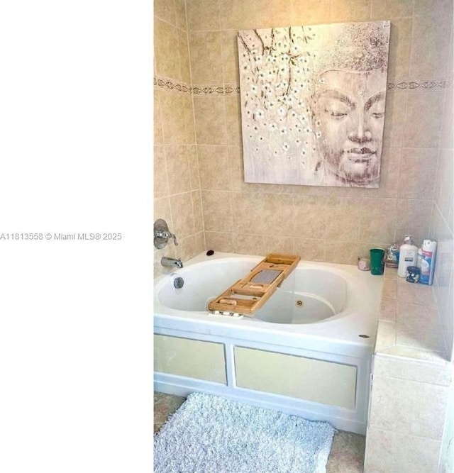 680 NW 111th Way, Coral Springs, FL 33071 - bathroom featuring a jetted tub