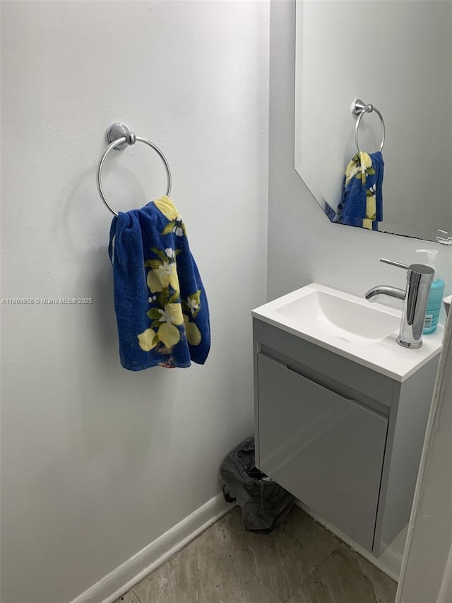 721 SE 1st Way Unit B18, Deerfield Beach, FL 33441 - bathroom featuring vanity and baseboards