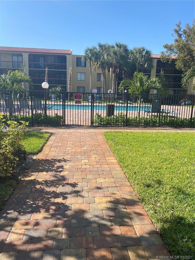 721 SE 1st Way Unit B18, Deerfield Beach, FL 33441 - view of community featuring a pool