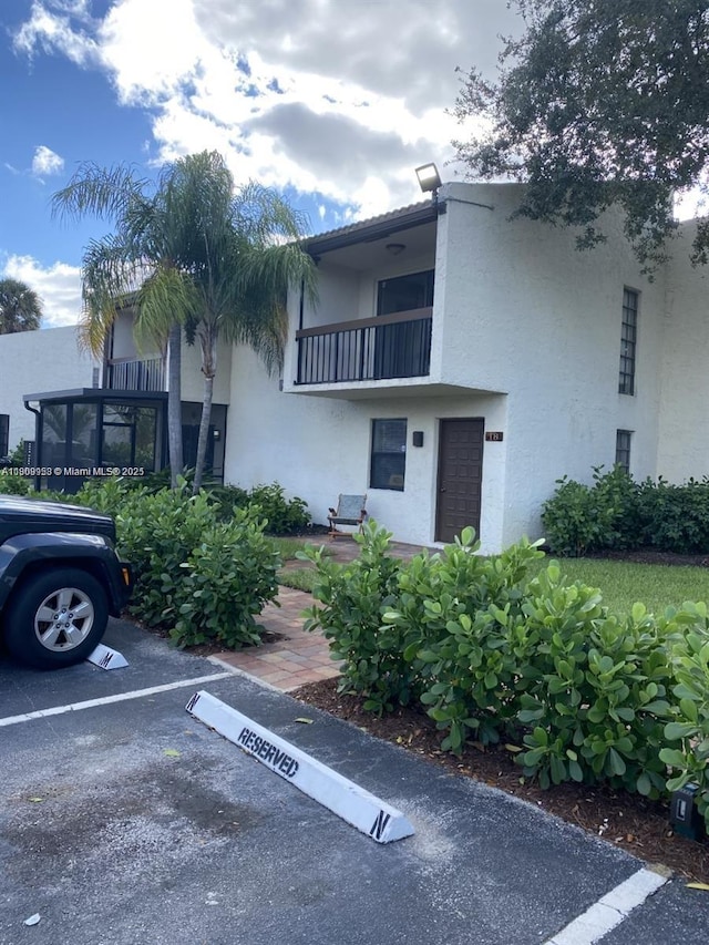 721 SE 1st Way Unit B18, Deerfield Beach, FL 33441 - view of building exterior with uncovered parking