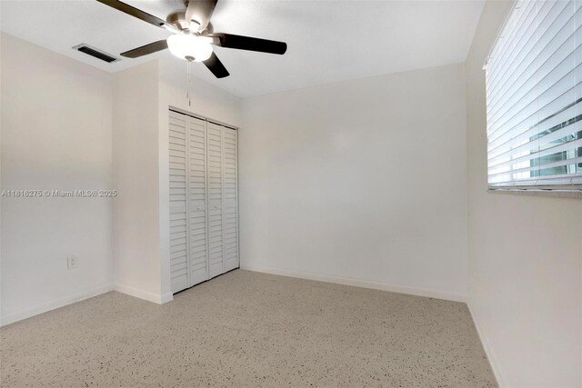 3421 SW 4th St, Miami, FL 33135 - unfurnished bedroom featuring speckled floor, ceiling fan, and a closet