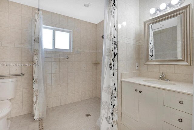 3421 SW 4th St, Miami, FL 33135 - full bath with tile walls, vanity, and a tile shower