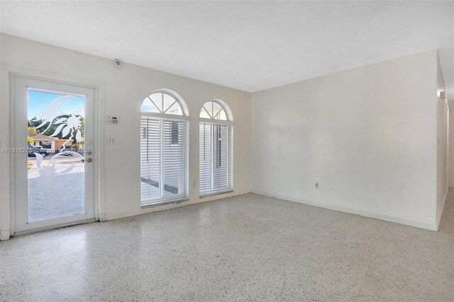 3421 SW 4th St, Miami, FL 33135 - spare room with speckle patterned floor