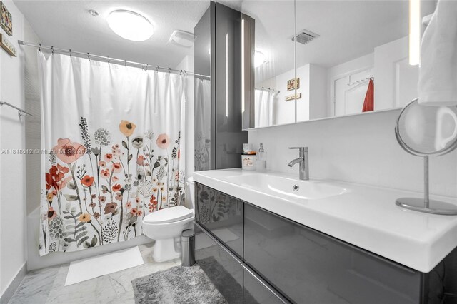 500 NE 29th St Unit 905, Miami, FL 33137 - bathroom with marble look tiles, vanity, and shower / bathtub combination with curtain