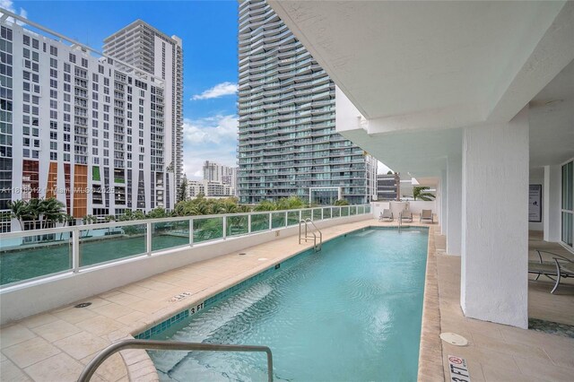 500 NE 29th St Unit 905, Miami, FL 33137 - community pool featuring a city view and a patio area
