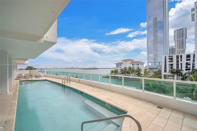 500 NE 29th St Unit 905, Miami, FL 33137 - community pool featuring a water view
