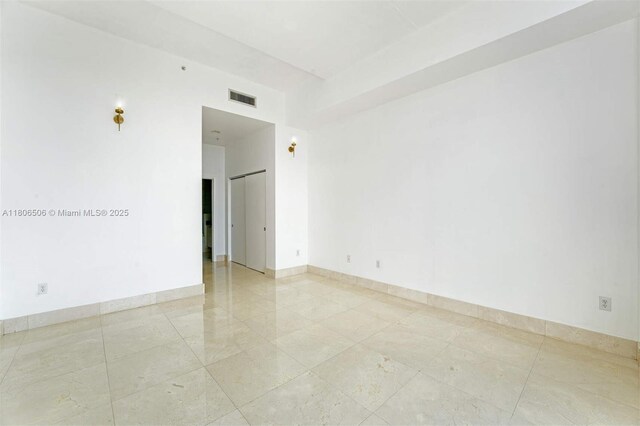 2001 Meridian Ave Unit 516, Miami Beach, FL 33139 - unfurnished room featuring light tile patterned flooring and baseboards