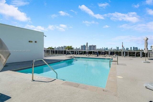 2001 Meridian Ave Unit 516, Miami Beach, FL 33139 - community pool featuring a skyline view