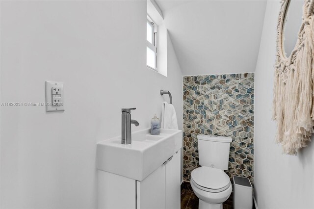 94825 Overseas Hwy, Key Largo, FL 33037 - bathroom with lofted ceiling and vanity
